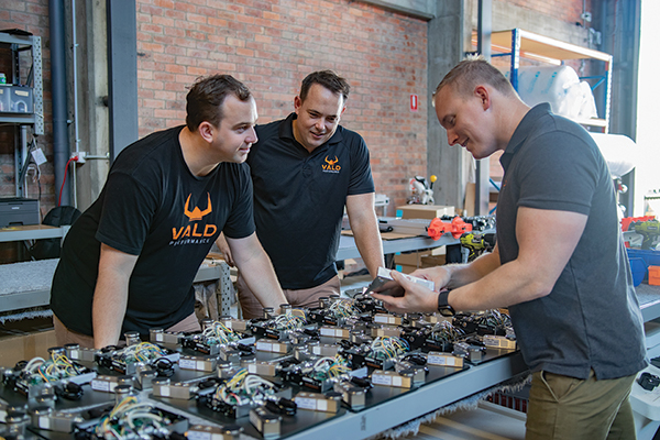 VALD engineers working on hardware in the Brisbane workshop